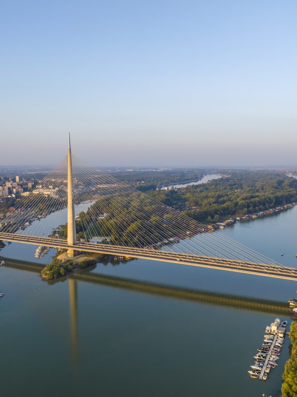 View of Ada Ciganlija from aerial drone and Most na Adi bridge over Sava River. Belgrade - Serbia